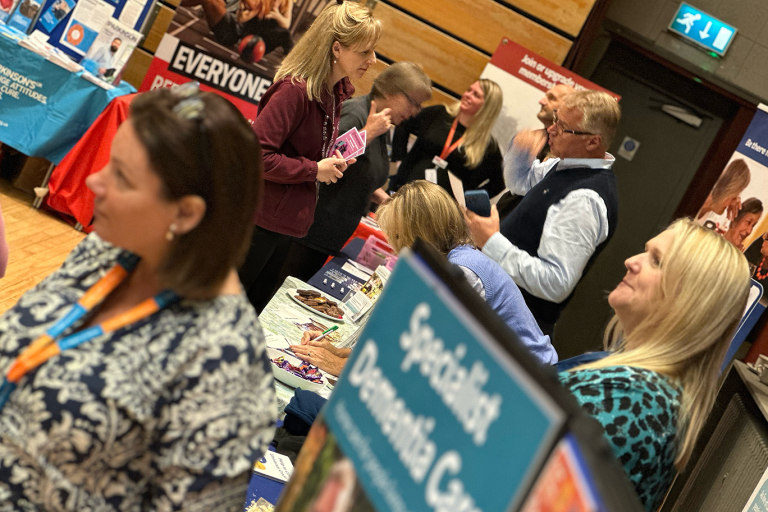 Dementia Festival stallholders giving advice and support